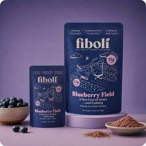 Fiboli Blueberry Field packaging with blueberries and cocoa powder on a purple background