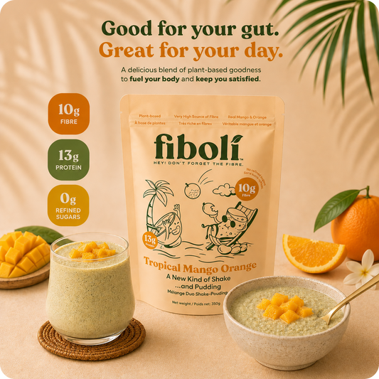 Fiboli Tropical Mango Orange shake and pudding package with a glass and bowl of the product on a beige background.